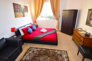 A bed or beds in a room at Lana Villa