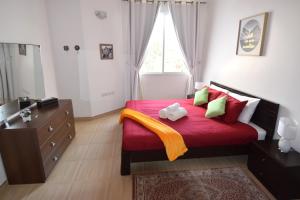 A bed or beds in a room at Lana Villa