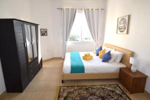 A bed or beds in a room at Lana Villa