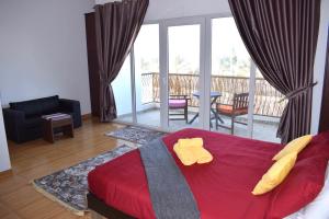 A bed or beds in a room at Lana Villa