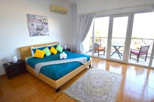 A bed or beds in a room at Lana Villa