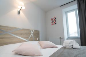 Postel nebo postele na pokoji v ubytování Le Relais Délys