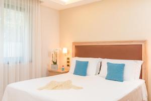 Postel nebo postele na pokoji v ubytování Oleandri Resort Paestum