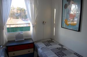 Postel nebo postele na pokoji v ubytování Lilla Solhaga