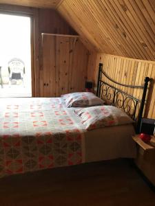 Postel nebo postele na pokoji v ubytování Le chant des oiseaux