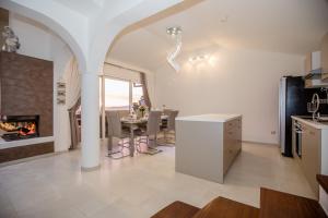 Kuchyň nebo kuchyňský kout v ubytování apartment HANA