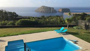 A view of the pool at Casa do Coronel or nearby