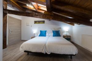Letto o letti in una camera di Petit Goierri
