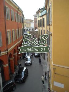 a sign for a street with cars parked on the street at Room & Breakfast Canalino 21 in Modena