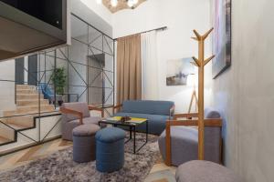 Posezení v ubytování Capital Hotel Garni