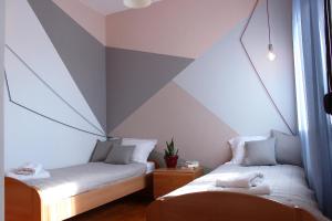 Posteľ alebo postele v izbe v ubytovaní Pinehouse King Suite
