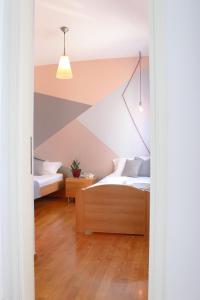 Posteľ alebo postele v izbe v ubytovaní Pinehouse King Suite