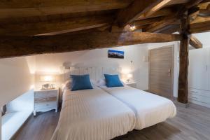 Letto o letti in una camera di Petit Goierri