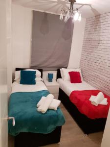 Ένα ή περισσότερα κρεβάτια σε δωμάτιο στο Vetrelax Chelmsford City Apartment