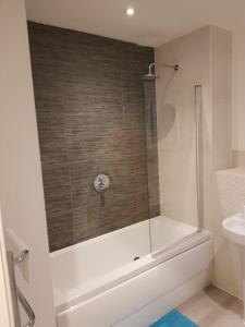 Ένα μπάνιο στο Vetrelax Chelmsford City Apartment