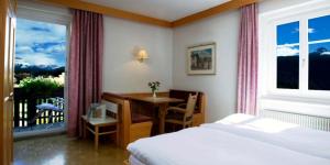 Posteľ alebo postele v izbe v ubytovaní Hotel Gasthof Stern