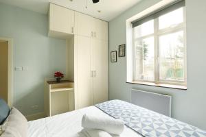 Posteľ alebo postele v izbe v ubytovaní Modern Flat Near Central London