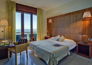 Voodi või voodid majutusasutuse Hotel Le Tegnue toas