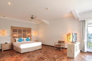 Postel nebo postele na pokoji v ubytování SOL by Meliá Benoa Bali All inclusive