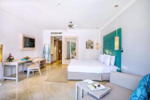 Postel nebo postele na pokoji v ubytování SOL by Meliá Benoa Bali All inclusive