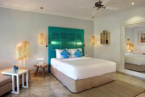 Postel nebo postele na pokoji v ubytování SOL by Meliá Benoa Bali All inclusive