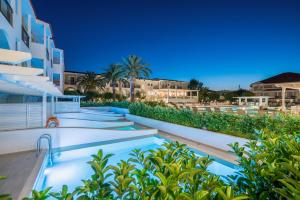an image of a swimming pool at a resort at Zante Park Resort & Spa BW Premier Collection in Laganas