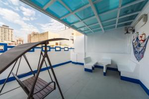 En balkong eller terrass på An Ping Shisan Hostel