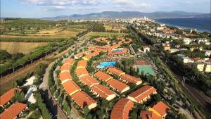 an aerial view of a city with a resort at Villaggio Mare Si in Follonica