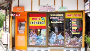 a group of shops with signs in front of them at Yoghurt Home 3 in Haad Rin