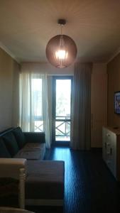 Χώρος καθιστικού στο Salome's Apartment at Bakuriani Residence