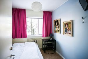 Postel nebo postele na pokoji v ubytování Igdlo Guesthouse + 37 fotografií