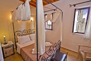 Postel nebo postele na pokoji v ubytování Camelot Traditional & Classic Hotel