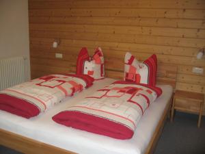 En eller flere senge i et værelse på Ferienwohnung Nicole