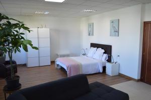 Posteľ alebo postele v izbe v ubytovaní Moai Loft