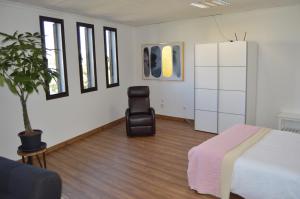Posteľ alebo postele v izbe v ubytovaní Moai Loft