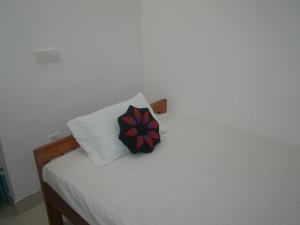 Letto o letti in una camera di Thuruliya Residence
