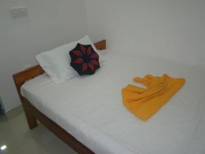 Letto o letti in una camera di Thuruliya Residence