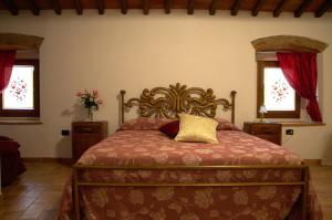 Posteľ alebo postele v izbe v ubytovaní SassoMatto b&b BioAgrituRelax