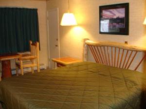 Postel nebo postele na pokoji v ubytování Georgetown Mountain Inn