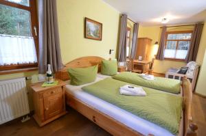 Postel nebo postele na pokoji v ubytování Hotel Köhlerhütte + 30 fotografií