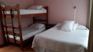 Voodi või voodid majutusasutuse Apart Hotel Colors toas