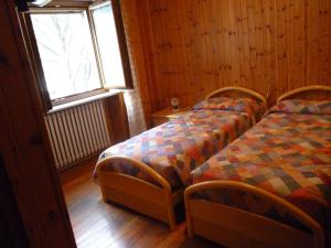 Postel nebo postele na pokoji v ubytování Hotel Fior di Roccia