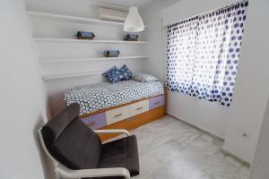 Posteľ alebo postele v izbe v ubytovaní Apartamentos Las Huertas
