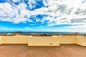 a view of the city from the roof of a building at Tenerife near aeropuerto in San Isidro