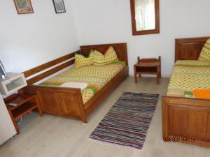 Postel nebo postele na pokoji v ubytování Casa Munteanu