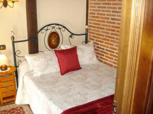 Postel nebo postele na pokoji v ubytování Apartamentos Azahar