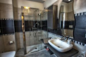 Kúpeľňa v ubytovaní La Grotta Hotel