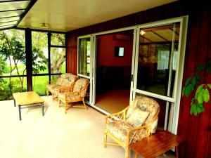 Posezení v ubytování Tudor Lodge Motel