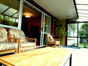 Posezení v ubytování Tudor Lodge Motel