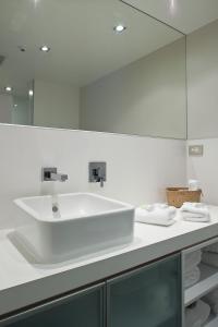 Ένα μπάνιο στο Wai Ora Lakeside Spa Resort